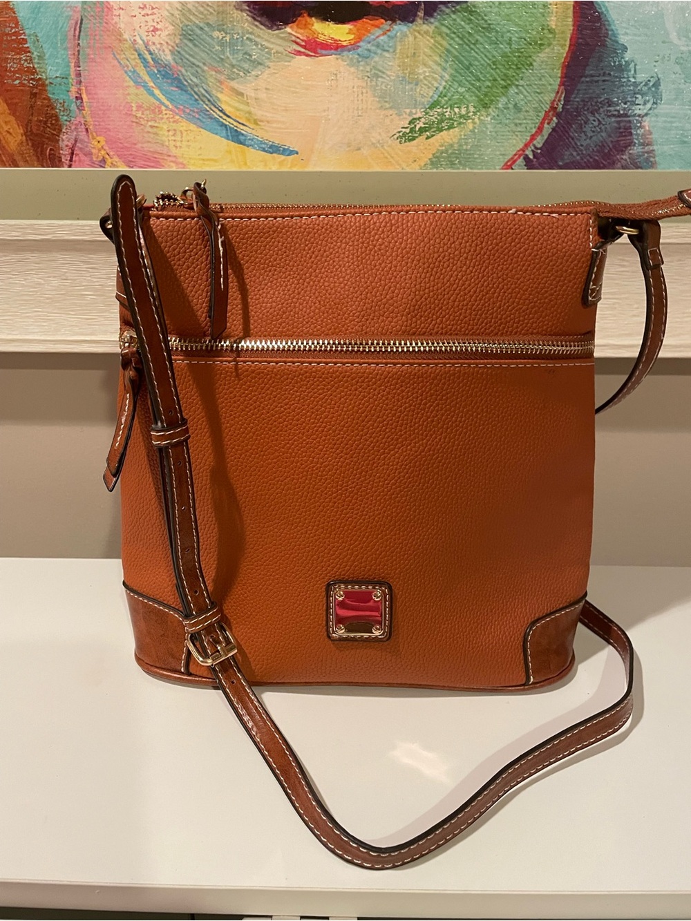 Pebbled ‘Leather’ Crossbody Bag in Saddle Tan